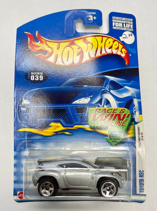 Silver Hot Wheels toy car in packaging with blue and yellow design